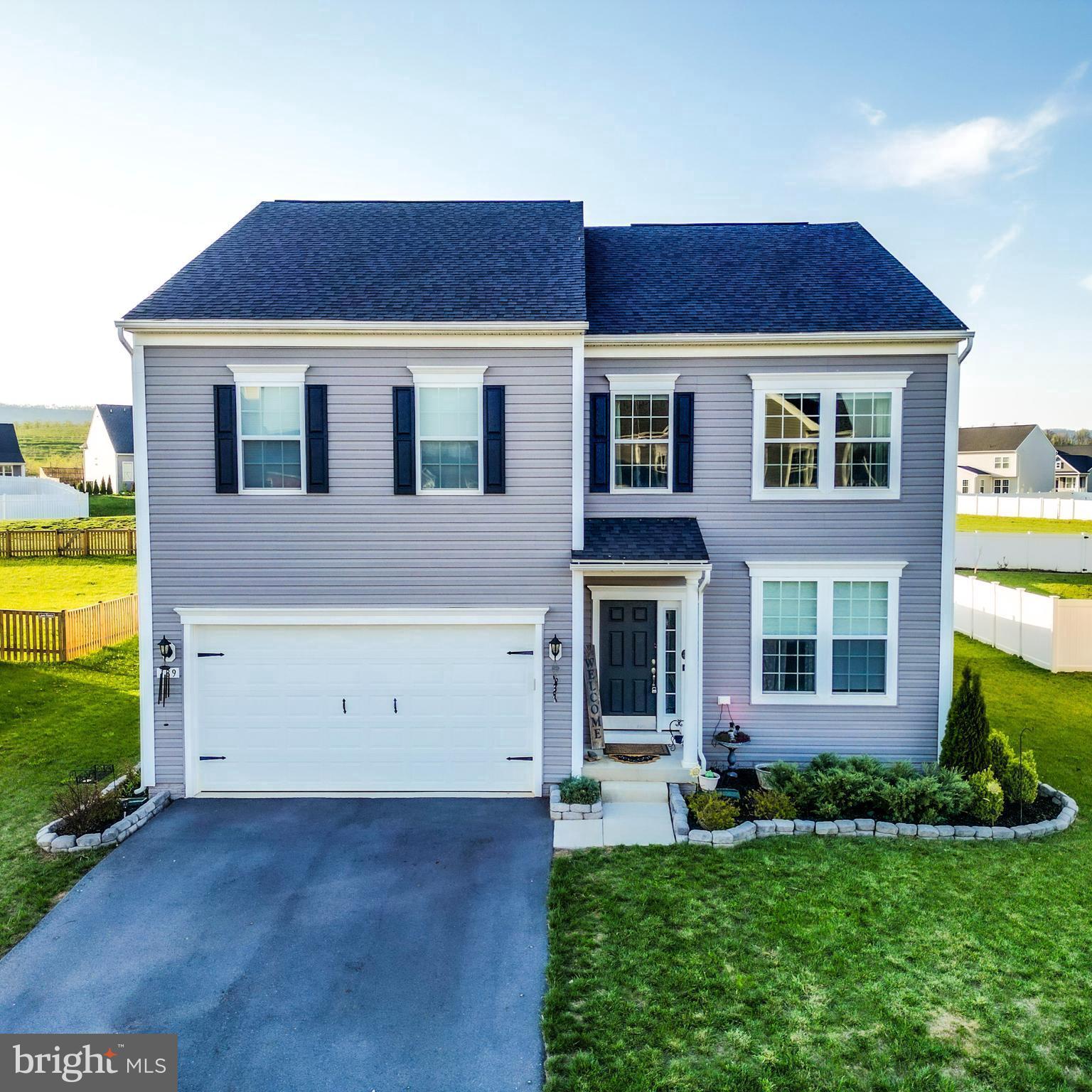 This home is located in the highly sought after neighborhood of Springdale farm and is only 15 min from both Winchester, VA and Martinsburg, WV. The home features 4 bedrooms, 3 1/2 baths, and a fully finished basement. The main floor provides an open concept kitchen, dining and living room. There is also a main level bedroom that can also be used as a home office. Upstairs there is an open loft that leads to 3 bedrooms and 2 full bathrooms. The basement provides more room for entertaining and an extra room with full bathroom. There is also storage areas and a home water treatment system in the basement. The home has an attached garage and fully fenced in backyard with patio.
Disclaimer: Home has been staged virtually as clients prepare for move.