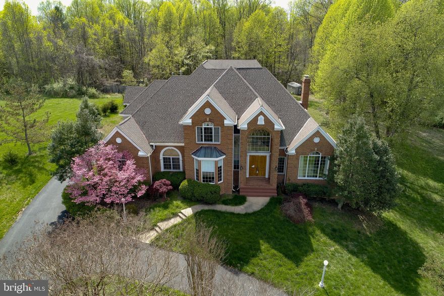 PRIVATE/SECLUDED in the great sought-out location of Fairfax Station. Centrally-located- 3.3 mile to shopping centers and Fairview Elementary, 2 mile from Burke Lake Park, 15 minutes from the Potomac riverboat landing. No Home Owner association. Insulated very efficiently. Natural gas heat. Unique design and layout emphasizing open concept and relaxing space. Tall ceilings. Inexpensive heating and cooling costs and high quality finishes throughout. 1,500 Sq Ft covered patio dressed with pavers, equipped with continuously-fed Natural gas barbecue, sinks, and outdoor country-style chandeliers. It is definitely the place to hold graduation and birthday parties. Two car carport spaces, fenced organic garden, newly paved 800 feet driveway, able to park many vehicles privately (come party-time!) Buyer's special bonus- Recently constructed two-level Carriage house of 3,200 Sq Ft., not included in the official Fairfax County Real-Estate Tax Assessment, with two MBR, two kitchenettes, and 2FBA, never occupied before. It is a steal- You get to own 7,737 SqFt. For the price of the real- estate assessment of 4,994 SqFt. I love the privacy of this home. I truly feel like living in a fun-filled equipped and secluded resort but minutes away from everything else in the Washington DC Metropolitan Area. Home Warranty Included.