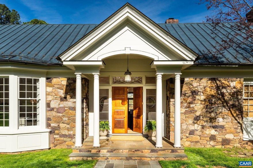 Just off Garth Road and minutes to town, this custom-built home offers sweeping mountain and pastoral views overlooking the protected 175 acres of Foxfield. Built with exceptional craftsmanship, the residence spans approximately 5,500 finished square feet with 4 bedrooms and 6 baths on 5.65 acres of beautifully enhanced landscaping. The light-filled interior features high ceilings, heart pine floors, and a thoughtful floor plan with generous living spaces, including an open kitchen with wood beam ceilings, elegant dining room, formal living room, private home office, and expansive primary suite. A stunning koi pond with waterfall creates a serene focal point outdoors, complemented by mature plantings and peaceful outdoor living areas. The property is fully fenced with deer fencing and includes an automatic gate at the driveway for added privacy. Garth Gate Lane is a private lane with no through traffic and only eight homes, offering a quiet and secluded setting. Recent improvements include new interior and exterior paint, updated fixtures, new carpet, and extensive landscape work. Additional highlights include a copper roof, generator, and quality construction throughout.,Glass Front Cabinets,Granite Counter,Painted Cabinets,Fireplace in Family Room,Fireplace in Living Room,Fireplace in Master Bedroom,Fireplace in Study/Library