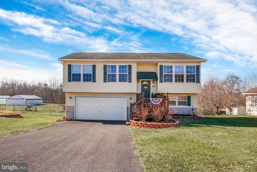 Own your own Gettysburg Address! Move in ready 3 bedrooms, 3 bathroom split foyer. Master bedroom includes a private master bath. Comfortable living room with large picture windows to enjoy the view. Lower level family room includes exercise area or room for an office. The family room also offers a luxurious bathroom with a large whirlpool tub. Spacious 2 car garage with extra room for storage. The private back yard is fenced in with 2 patio areas and fire pit. Great commuter location, easy access to Route 15 and less than 10 minutes to the Square for relaxation! Don't miss this one!