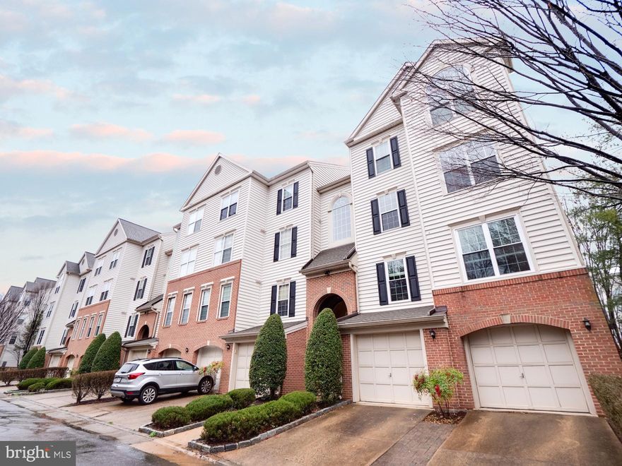 Remarkable 2 bed, 2 bath condo with stunning updates!!! The owners suite includes a spacious bedroom, plus a complete 2017 bathroom overhaul with travertine stone floors and walls, walk-in shower with glass door, custom dual sink vanity with granite counters, extensive above-counter cabinets, and under counter drawers and storage. Yes, this is your dream bathroom!!! Hall bath includes the same 2017 remodel with travertine stone floors and walls, and ample drawer and under the counter storage. The spacious, sun-filled living area boasts gleaming oak hardwoods, gas fireplace, and dining area. Kitchen has stainless steel appliances, white cabinets and a large pantry. Walk out to the private covered balcony to enjoy your morning coffee or some fresh air after a long day at work! Washer/Dryer  included in the hallway laundry room! Association Fees Cover: Water, sewer, trash, snow removal, POOL and clubhouse. Comes with a reserved parking space and plenty of guest parking. Community features include pool, clubhouse, playgrounds, and grill area. Manors at Stonegate is just minutes to Shirlington, Old Town, or Bailey’s Crossroads, and on both Metro and Dash bus lines. Be at I-395 in less than 5 minutes for a short drive to DC, Pentagon, or HQ2! The newest Silver Diner (and Harris Teeter Grocery - not yet open) is about a 15 minute walk from your front door. Don’t wait to come see this one!