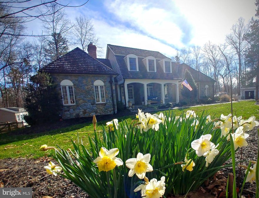 This has always been my favorite all time home.  The warmth of this french country cottage makes you forget its almost 6000 sq ft of home.  Enjoy the ammenities of Virginia Run or those of your own private 5 + acre estate lot on public water & sewer backing to Cub Run.  This home has an attached 2 car garage and an oversized detached two car garage.  Beautifully hardscaped with stone walls, flagestone walks, covered and uncovered outdoor areas . The pool has a waterfall and hot tub is surrounded by flagstone patio and fireplace area.  Follow the trail out the back gate to fish on Cub Run or hop on the Cub Run Trail System.  Once you enter the home you will fall in love with the charm of warmth  even with two story tray ceilings, four fireplaces, gourmet kitchen, first floor master suite, upper level rooms all have access to a full bath, LL bedroom and bath, LL library  with custom tray ceilings and wood work.  All of this with custom tiles, woodwork, marble designs, granite and marble tops.  I promise you will love this home.  Pool table and cues, 5 wall mounted tvs, metal pool furniture-lounge chairs, chairs tables and cushions, garage frig all convey.