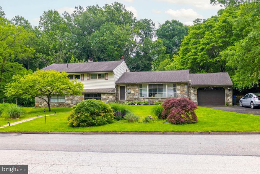 Come see this one-of-a kind split-level, 3300 sq ft 4 bedrooms, 2 full, 1 powder room backing up to the Curtis Arboretum in Wyncote c 1954. The large front, side, and yard has mature landscaping, tall grasses, and a wildflower meadow that blooms late spring into the fall.  
The large front, side, and yard have mature landscaping, tall grasses, and a wildflower meadow that blooms late spring into the fall. Add to this the peaceful sounds and beauty of a creek that flows behind this home.  Enter into the foyer on the main level with bamboo floors, which leads to the light filled open living and dining rooms. The kitchen features stainless steel appliances and beautiful and durable quartz countertops. The finished basement is perfect for entertaining, home office space, or a guest suite. It includes a workout room, den/bedroom, family room, stone fireplace, and a custom wet bar. The basement opens up to a very private backyard with a stock tank pool and a large storage shed. The primary bedroom has a walk-in closet and changing room.  A solar power system, pellet stove, and dual flush toilets make this home more sustainable and help to lower electric and water utility bills.  From candy-like lacquer to funky style, these retro trends are bringing both nostalgia and charm.

Retro trends are back and better than ever —and trust me, they’re here to stay. These Sellers' are mixing '50’s grooviness (think: lacquered pops of color, bold patterns, and charming vintage.  Your own in-ground pool plus your own Park. Sustainable Architect owner, who appreciates GREEN! The magic is in the mix.

Whether cooking in the updated NEW kitchen, hosting a dinner party, or sipping a nightcap in a jazz bar, vintage lighting brings the magic and big windows bring the sun. Because as we all know, a little sugar goes a long way.