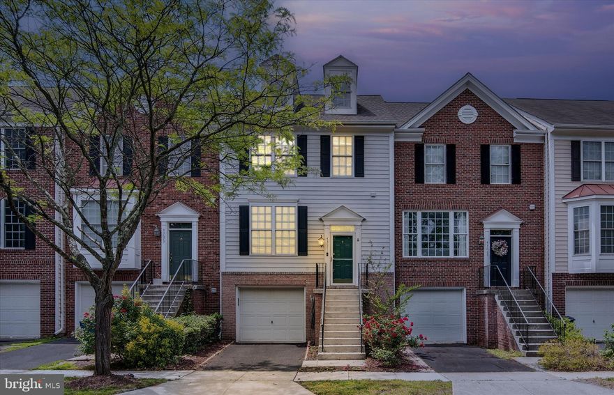 Welcome to this beautifully expanded 4-level townhome nestled in the heart of South Riding! With a rare 3-level bump-out, this home offers over 2,400 sq. ft. of comfortable living space, designed for modern lifestyles and flexible living.

The main level showcases gleaming hardwood floors, elegant recessed lighting, and an open-concept layout ideal for everyday living and entertaining. The spacious kitchen opens to a bright family room and leads to a large deck—perfect for morning coffee or evening dinners, overlooking a private common area.

Upstairs, you'll find three generously sized bedrooms, including an impressive primary suite with a vaulted ceiling and private loft—ideal for a home office, yoga retreat, or cozy reading nook. The walk-out lower level includes a fourth bedroom, full bath, and a large recreation room—perfect for guests, movie nights, or multi-generational living.

Recent upgrades include a roof replaced approximately 8 years ago, and appliances updated within the last 5 years. The home also features a 1-car garage, ample unassigned parking, and a fully fenced backyard for privacy and play.

Located in the sought-after South Village section of South Riding, this home offers unbeatable community perks:
🎾 Tennis & Pickleball Courts
💦 Four Outdoor Pools & Splash Park
🐾 Dog Park & Playgrounds
🌿 Walking/Biking Trails, Parks & Fishing Piers
⛳ Short walk to South Riding Golf Club

Enjoy easy access to Dulles Airport, Route 50, the Dulles Technology Corridor, and everyday conveniences like grocery stores, restaurants, and the Dulles South Rec Center—complete with indoor pool, lazy river, gym, and more.

Don't miss your chance to own this spacious, upgraded, and ideally located home in one of Loudoun County’s most vibrant communities. Schedule your tour today!