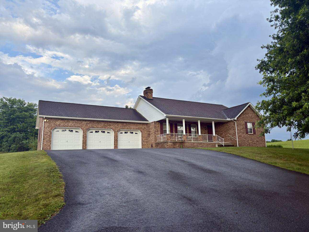 3 bedroom, 2 bath home nestled on 7.02 acres. This home has beautiful views and all about location, location, location! Enjoy peace and tranquility in a country setting, but close to Hancock and I-70 for travel. This home's location offers the best of both worlds. Enjoy a seat on the sun porch and watch the wildlife. This lovely house is one-level living and has a finishable basement to add additional square footage. The laundry room is on the main level. The basement has walk-out french doors for easy outdoor entertaining. 3 car garage gives access right off the kitchen for an ideal grocery haul. Endless possibilities with no restrictions! Southern Fulton School District