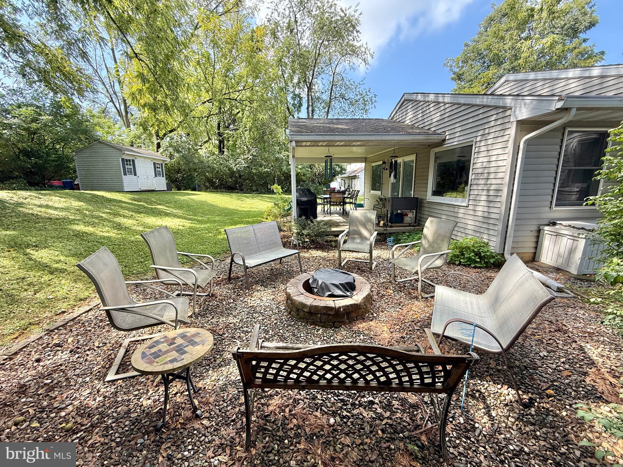 Welcome to 1120 Riverview Dr., located in the highly sought-after Muhlenberg Township!
Looking for a home that feels private yet keeps you close to everything? You’ll love being just minutes from shopping, schools, the beautiful Jim Dietrich Park, and more—with easy access to Harrisburg, NYC, Allentown, and Philadelphia.
This 3-bedroom, 2.5-bath ranch home sits on a quiet cul-de-sac and features a two-car garage with an extended driveway. Offering true first-floor living, it’s move-in ready and designed for comfort.
Step inside to a spacious living room highlighted by a custom mirror wall. Down the hall, you’ll find three bedrooms and a full bath. The primary suite includes a private bathroom, a custom barn-style door, two large closets, and fresh paint.
On the opposite side of the first floor, you will find an updated half bath, large laundry room with sink. The dining room and kitchen feature built-in appliances including a brand new glass stovetop, a new countertop, a large double pantry, and a modern sink with updated faucet. Just off the dining room is a large family room with many windows for natural light and views to the rear yard which offers seasonal colors, tile flooring and sliding glass doors leading to the backyard.
The semi-private rear yard is perfect for entertaining, complete with a covered patio and fire pit. A shed and a commercial-grade Kohler generator are included as well. The expansive basement offers endless possibilities for additional living space.
Recent updates, worth thousands of dollars, include top of the line mechanicals of central air, a high-efficiency gas furnace with an upgraded whole-house humidifier, an Ecowater filtration and water softener system, and a Bosch tankless water heater.
Contact the listing agent today to schedule your private showing!