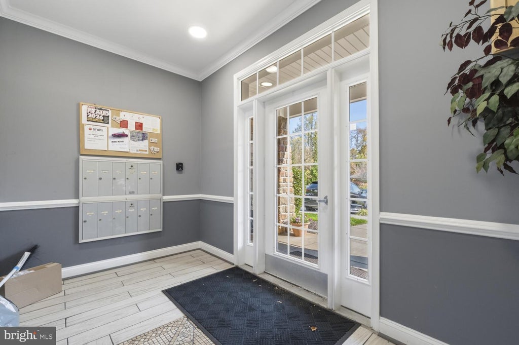 Photo of 300 Wyndham Circle #300D, OWINGS MILLS, MD 21117 (MLS # MDBC2179946)