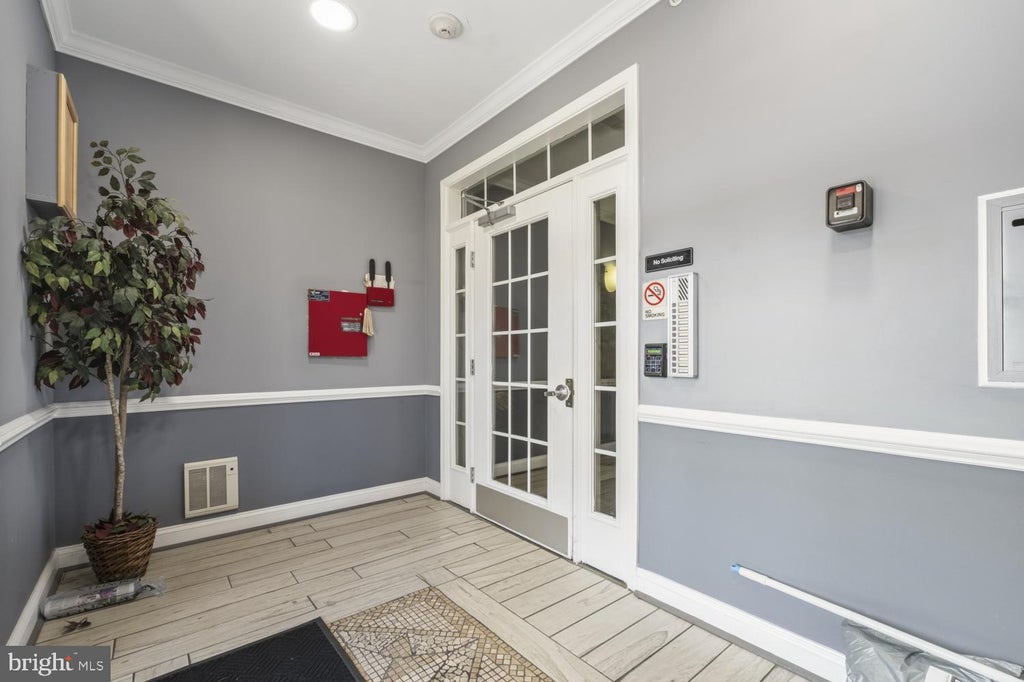 Photo of 300 Wyndham Circle #300D, OWINGS MILLS, MD 21117 (MLS # MDBC2179946)