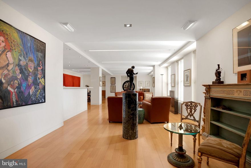 1901 Walnut St.,14BE, The Rittenhouse Plaza- This enchanting 3,333 square foot residence, meticulously reinvented to preserve its timeless charm exemplifies contemporary luxury and invites you into a world of sophisticated living where every detail has been carefully curated to offer you an unparalleled experience in comfort and style. The 40 foot living room with 6 windows overlooks Rittenhouse Square. There are 4 bedrooms, 4 1/2 baths and a library/den. One bedroom is currently used as a home office. There is a huge, beautiful dining room area! The gourmet chef’s kitchen is a culinary haven with 2 Wolf ovens, a Sub-Zero Refrigerator, a Wolf convection microwave oven with proofing drawer, a Wolf 5 burner gas cook top, a Miele dishwasher, double basin stainless steel sink, Grohe faucets, huge amount of stunning cabinetry. There is a wet bar with Sub-Zero wine fridge, extra sink, disposal and Grohe faucet. The subtle tasteful backsplash is a fitting background. The kitchen floor is cork. The primary suite has huge walk-in closets and a large, wonderful bath with double sinks, large steam shower, whirlpool tub and heated towel bar. The primary flooring is Quarter Sawn Red Planking. Owners can use the facilities at The Laurel for an additional fee. The monthly co-op fee includes real estate taxes, Fios cable, internet, heat, water, sewer, and building maintenance. A one-time co-op transfer fee of 1% of the purchase price is paid at closing along with a $1,250 application fee. Seller is paying for 1 year of parking at one of the three nearby garages.