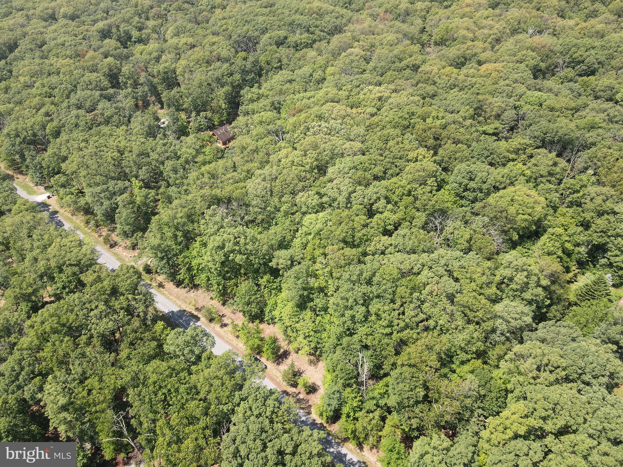 This 3.02 acre lot offers a perfect location to build your dream home or vacation getaway in the woods, with a very usable gently sloping lot. On a well maintained gravel road just off the main paved roads. Private community River access and amenities, situated within the gated River Ridge community, the property benefits from protective covenants ensuring your peace of mind.
Enjoy exclusive access to community amenities including showers and restrooms, picnic benches and grills, and secure kayak storage so you can leave your kayak right down by the river and enjoy your private community access within your gated community! With amenities like that you can spend all day at the river! Embrace the peaceful surroundings and make this your personal haven.
Buyers please note, it is a gated community and you won't be able to drive by without an agent to show.