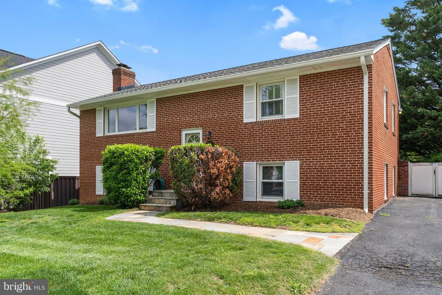 Where else can you find a spacious, move-in ready home on a large, private lot just minutes from the heart of Ballston? Welcome to 511 N Wakefield Street, a well-maintained property that offers the rare combination of outdoor space, urban access, and flexibility—all in one of Arlington’s most sought-after neighborhoods.

This home places you just a few blocks from the newly reimagined Ballston Quarter, where you'll find a vibrant mix of dining, shopping, entertainment, and community events. From chef-driven restaurants and open-air plazas to the MedStar Capitals Iceplex and Regal Cinemas, Ballston offers year-round activity and convenience. It’s also a commuter’s dream, with quick access to the Ballston Metro, Route 66, and other key transit options.

Out back, the home’s flat, fenced yard with classic brickwork is a true standout—offering scenic views toward the Ballston Commons area and two screened-in porches ideal for entertaining, relaxing, or enjoying a peaceful evening. Inside, the home features generous living spaces, hardwood floors, and updated kitchens and baths. The layout is comfortable and adaptable, whether you’re settling in now or envisioning future updates or expansion.

With private driveway parking and a quiet residential feel just moments from everything Ballston has to offer, 511 N Wakefield Street presents an uncommon opportunity in a rapidly growing, amenity-rich community.