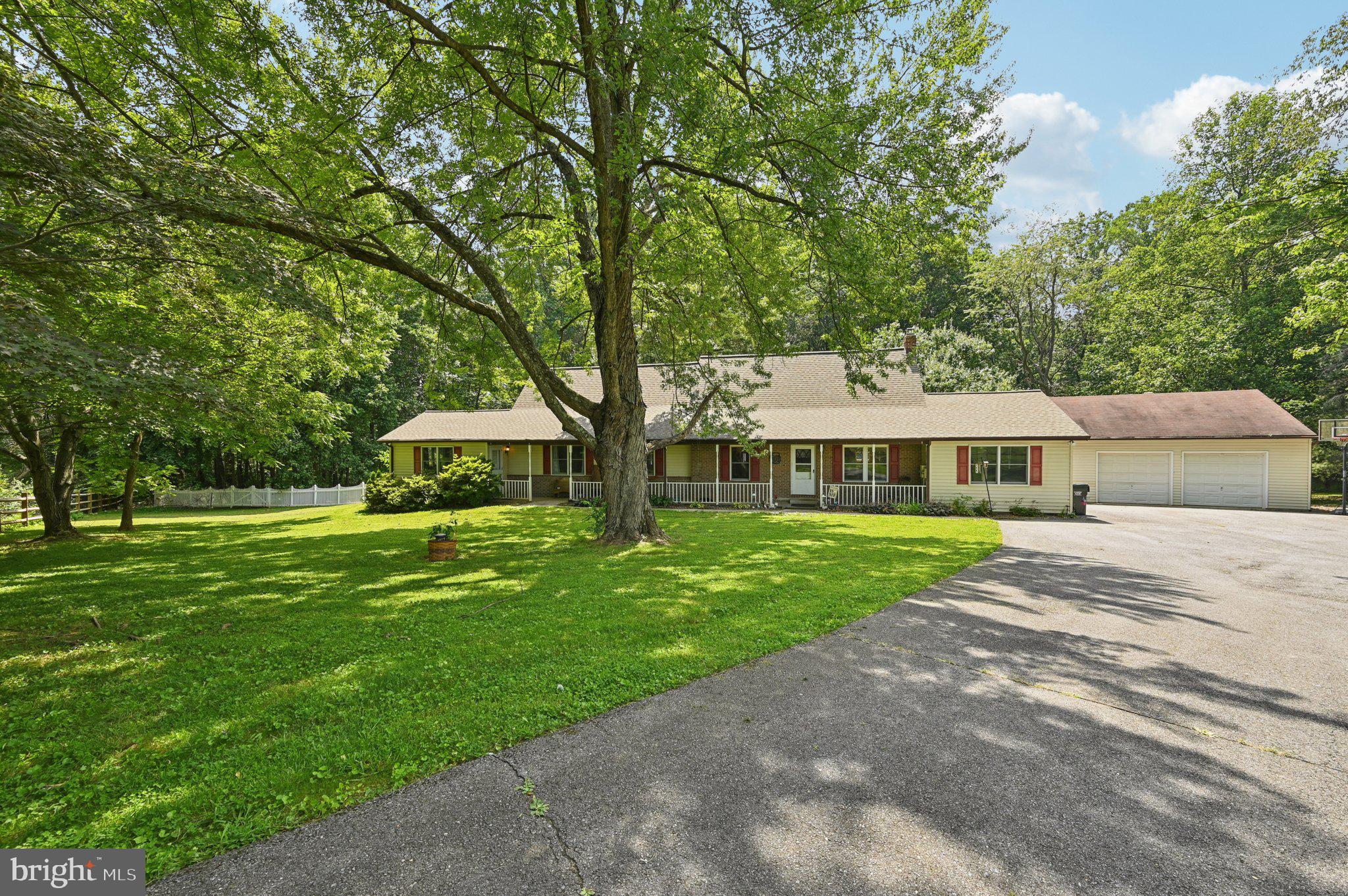 Private Retreat in the Heart of Mount Airy
This spacious 4-bedroom, 3-full-bath home offers the perfect blend of comfort, functionality, and peaceful living. The main level features a generous Owner’s Suite with a private sitting room and beautifully appointed en-suite bath, along with a second large bedroom—ideal for one-level living. You’ll also appreciate the main-level laundry room, a well-equipped kitchen with a center island, a cozy family room, and a separate dining room—perfect for everyday living and entertaining.
Upstairs, two additional bedrooms and a third full bath provide flexible space for family, guests, or a home office.
The partially finished lower level offers over 1,000 square feet of additional living space—ideal for a home gym, media room, or future in-law suite.
Car enthusiasts, hobbyists, or those with recreational gear will love the oversized detached 2-car garage, which includes plenty of space for vehicles, 4-wheelers, and a dedicated workshop area.
All of this is set on over 3 private acres, with a peaceful backyard that backs to mature woods. Enjoy your morning coffee while spotting deer, bunnies, squirrels, and a variety of birds—your very own nature retreat just minutes from downtown Mount Airy, commuter routes, shopping, and dining.