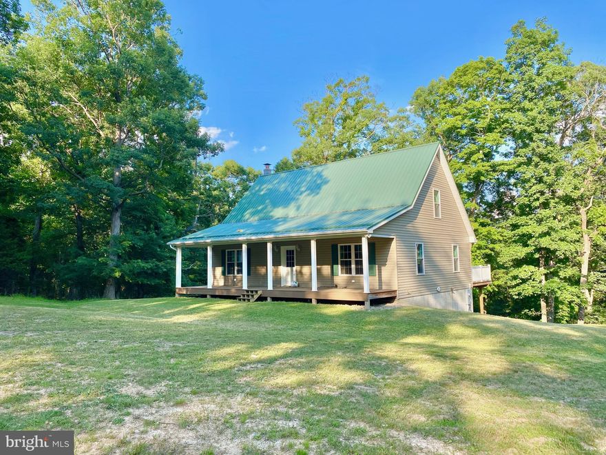 This is It!!!   Your dream retreat nestled on 10.6 unrestricted acres of serene landscape in the heart of the West Virginia mountains.  Recently constructed, this modern rustic home offers the perfect blend of tranquility and convenience. Boasting 3 bedrooms and 2 full baths, it features a full poured concrete walkout basement, ideal for additional living space or storage.

Step onto the expansive Trex board front porch or rear deck, or relax on the concrete patio outside the walk-out basement, all while enjoying the peace of your secluded surroundings. The gourmet kitchen is adorned with granite countertops, perfect for culinary enthusiasts. Indulge in the custom-designed shower in the primary bedroom, adding a touch of luxury to everyday life.  Accessible via a freshly graveled driveway, this barely-lived-in home ensures privacy and seclusion, making it an ideal retreat from the hustle and bustle. Embrace modern comforts amidst the natural beauty of the West Virginia mountains. Your search ends here, there are very few properties that exist like this one!!  Call Today for a Private Showing!