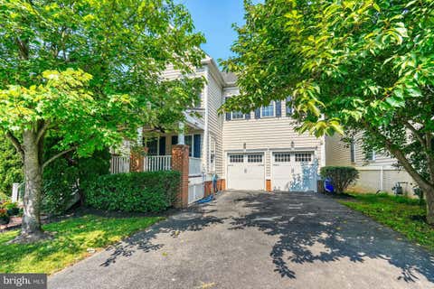 Photo of 23218 Robin Song Drive, CLARKSBURG, MD 20871 (MLS # MDMC2244390)