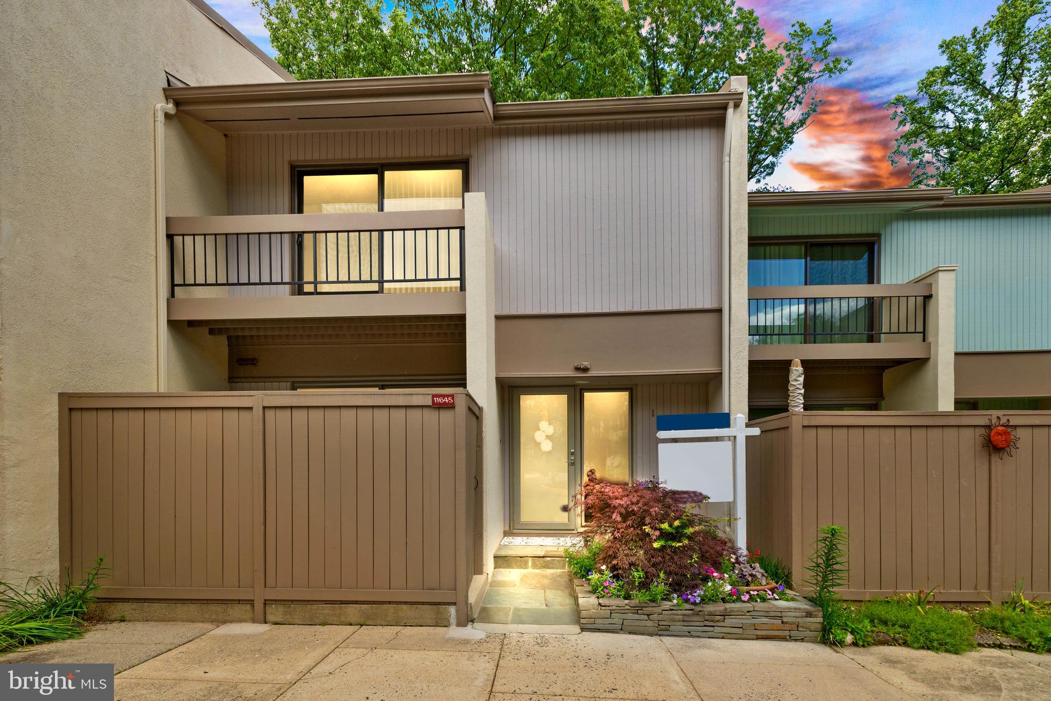 Welcome to this thoughtfully designed 4-bedroom, 3.5-bathroom townhome in the sought-after Newbridge Cluster of Reston, tucked along the peaceful fairways of Reston National Golf Course. Step inside and you’ll be immediately drawn to the showstopping wood-burning fireplace—a striking centerpiece that anchors the living space with warmth, charm, and timeless appeal.
Bamboo flooring stretches across the main level, adding natural elegance, while the kitchen shines with quartz countertops, an elegant backsplash, and stainless steel appliances—combining modern style with everyday functionality. The entire home has been freshly painted, with new carpet, new ceiling fans and lights in the upstairs bedrooms, making it truly move-in ready.
Enjoy your morning coffee or unwind at sunset on the newly finished back deck, where serene views of a tree-filled natural sanctuary offer the kind of privacy and peace that’s hard to find.
Upstairs, you’ll find three generously sized bedrooms and two full bathrooms. The walk-out lower level offers even more flexibility with a fourth bedroom, full bath, rec room, and a large laundry and storage area—perfect for guests, a home office, or multi-generational living.
Major updates bring peace of mind: a brand-new HVAC system (2024), and a new roof, windows, water heater, and front door (2022) enhance comfort, improve energy efficiency, and reduce long-term costs—setting the stage for confident homeownership.
Living here means enjoying all the benefits of the Reston Association, including access to 15 pools, tennis and pickleball courts, miles of wooded trails, lakes, and year-round community events. All just minutes from Wegmans, Reston Town Center, and major commuter routes—including Metro access.
Here, every detail supports a lifestyle of ease, beauty, and connection. This isn’t just a home—it’s your next chapter.