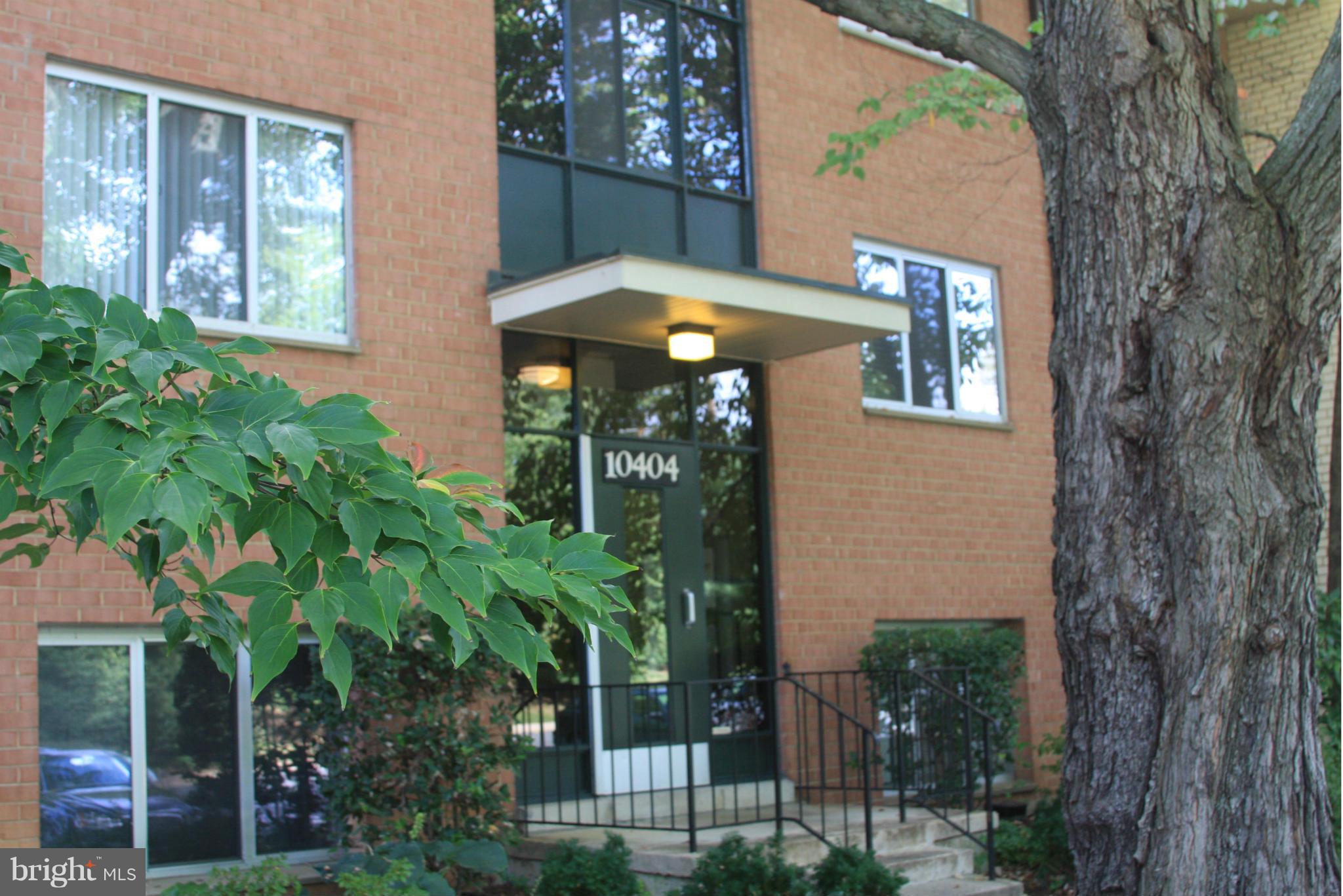 Hurry, this will go quickly! Rare, 2 BR, garden-style condo STEPS TO Metro! Sunny exposure with balcony overlooking pond & park-like setting. One flight up from parking & bldg. entry. All new paint, updated kitchen w/ ceramic floors & backsplash, Corian counter & sink. Refinished wood floors. Condo fee includes all utils, parking, extra storage, pool, & tennis. Mins from 495 & 270, Bethesda, NIH