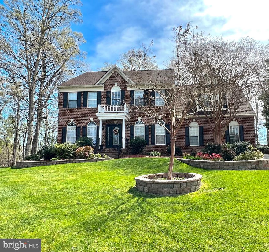 Looking for a home that has a fully finished basement with kitchen and separate laundry?  This is the one you have been waiting for!  Beautiful home in Hampton Oaks.  Great location for easy access to I-95.  Large cul-de-sac lot, fully fenced, backing to Hampton Oaks Elementary.  Ridgewood Homes, a custom builder, personally built the home for himself.  Upgrades include- heated/cooled side load two car garage, additional detached garage for storage, gourmet kitchen with double ovens, newer appliances, brand new refrigerator on the main level,  built in bookcases, crown molding, new AC unit for the upper level of the home just installed, new roof installed two years ago, new basement bathroom tile and vanity, professional landscaping with pathway lighting, and wireless irrigation system.  Home was just power washed!  The best part of this home is the fully finished basement with two bedrooms, kitchen, laundry, full bathroom, and walk out access.  Home features two gas fireplaces.  Open concept floorpan with an abundance of natural light pouring in the oversized windows.  The only thing this home is missing is you!  Schedule your showing today or come by one of the open houses on Saturday, 7/2 from 1-3pm or Sunday, 7/3 from 2-4pm.