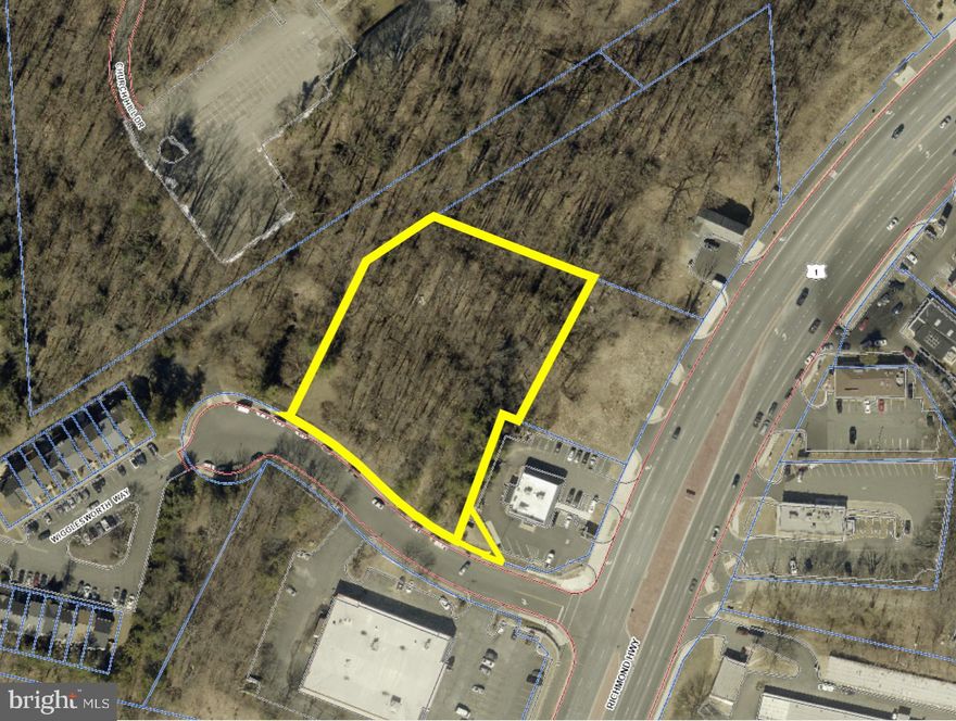 1640 Wigglesworth Way presents a compelling infill redevelopment opportunity on the Jefferson Davis Highway (US Route 1) corridor in Woodbridge, Virginia. The ±1.75-acre parcel is zoned B-1 General Business, requiring no rezoning for retail, restaurant, office, medical, childcare, and service uses by-right. The site sits less than one mile from the I-95 Woodbridge interchange and fronts Route 1 at 37,000 vehicles per day (VDOT). The surrounding Woodbridge and Dale City submarkets rank among the most populous communities in the Northern Virginia metro, with strong household incomes and sustained Prince William County population growth driving consistent demand for commercial services along this corridor. A prior site plan (PWC Case No. 05-00384) advanced through five formal review cycles and reached near-approval status in 2007 for a proposed ±34,000 SF two-story multi-tenant retail and office center. The prior process produced a full suite of completed technical studies — geotechnical investigation, stormwater detention design, architectural plans, and PWCSA utility confirmation — all available to an incoming buyer and representing meaningful pre-invested due diligence that reduces cost and timeline risk for a new development program. The site accommodates a wide range of B-1 uses beyond the prior concept, including QSR or drive-through, medical or professional office, childcare, or financial services. The property is delivered as vacant land with no demolition, remediation, or tenant displacement required.
