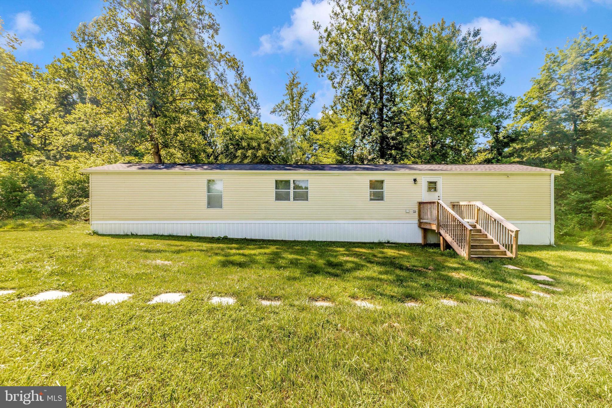 Mobile home on 3 acres! Walk into your spacious foyer with luxury vinyl plank flooring. Kitchen with lots of cabinets and plenty of counter space. Large dining room area. Owners bedroom with private bathroom. Bedrooms 2 & 3 are a great size and share a 2nd full bathroom. Half a mile to the river! Great location private but not too far from highways, restaurants and major highways.