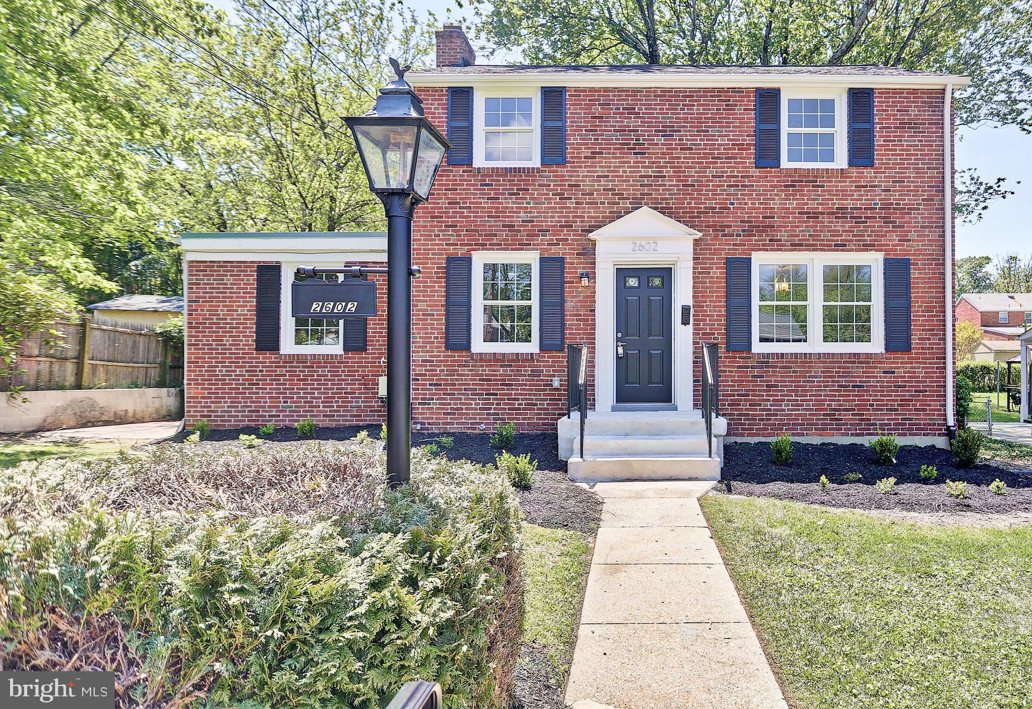Fantastic renovation of this traditional brick colonial. New pretty much everything -- New roof, new windows, new kitchen with stainless, quartz, 42 inch cabinets, breakfast bar, new 2.5 baths, new CAC, etc. refinished hardwood floors. Living room fireplace. First floor bedroom with full bath. larch patio, fenced yard. Walk to METRO