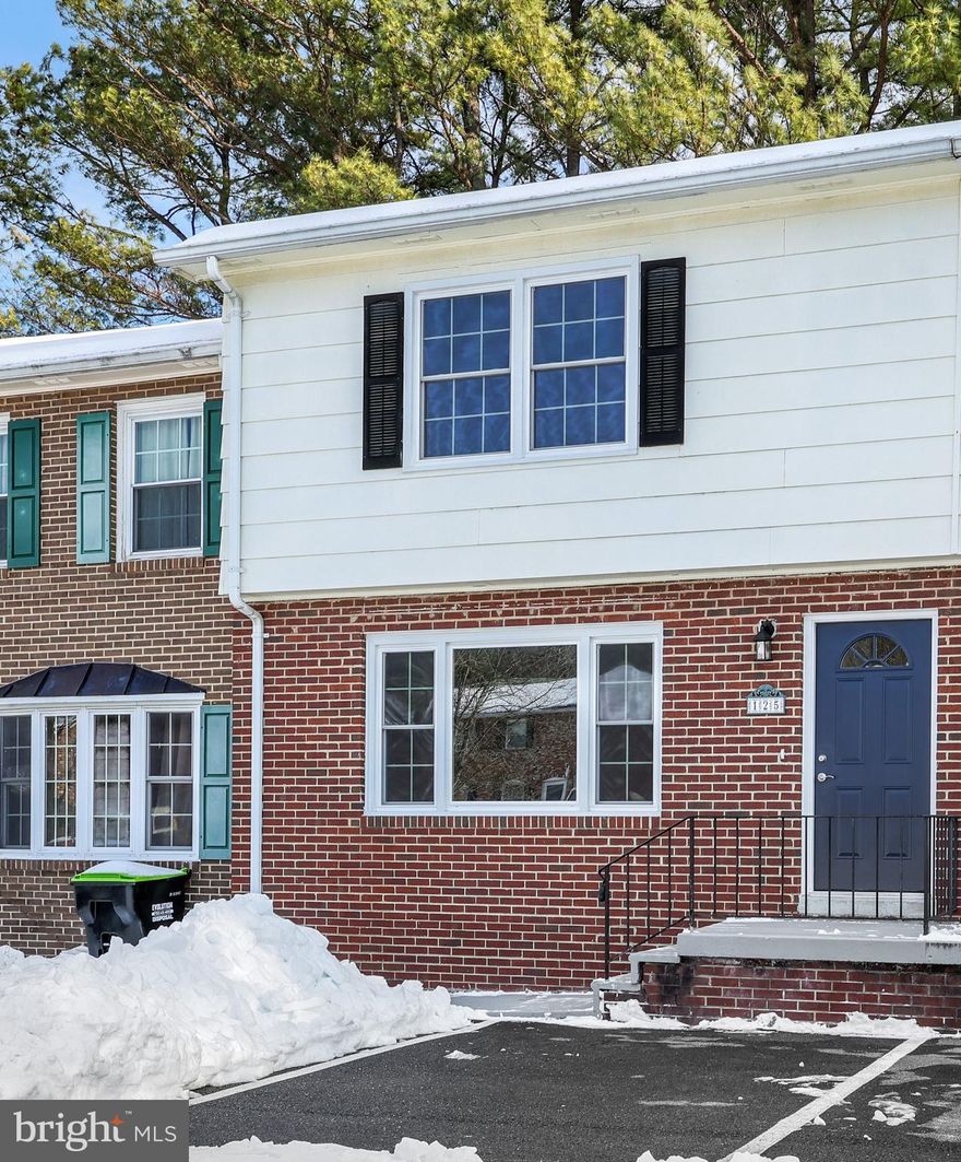 Charming and extensively updated 2-bedroom townhome in a prime location—just one block from Martin's shopping center and minutes from major commuter routes. This home features fresh interior paint, new flooring, and ceiling fans in the kitchen and bedrooms for added comfort.

The beautifully updated kitchen offers American Woodmark cabinets, new countertops, and a full appliance package including a stove, wall microwave, refrigerator, dishwasher, garbage disposal. Both bathrooms have been remodeled with new toilets, vanities, sinks, and an updated shower.

Recent improvements also include new windows, a new exterior front door, a privacy fence, and a small landing/porch off the back door—perfect for outdoor enjoyment. The large unfinished walk-out basement provides outstanding potential for easy expansion and future living space. Brand new washer and dryer in basement are also included.  Move right in and enjoy the updates, convenience, and opportunity to build equity in a desirable location.