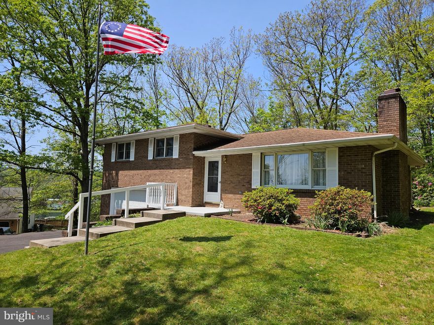 Welcome to 175 James Street, a charming  brick tri-level home nestled at the end of a quiet cul-de-sac in Fort Ashby, West Virginia. This delightful property is now available for sale, offering you the perfect opportunity to make it your own!

With 3 bedrooms and 2 bathrooms, this spacious home provides ample space for comfortable living. The clean and organized interior creates a warm and inviting atmosphere from the moment you step inside. The beautiful architectural shingles add a touch of elegance to the exterior, enhancing the curb appeal of this lovely residence.

One of the standout features of this property is the 2-car garage, providing convenient parking and extra storage space for all your needs. Woodstove insert in lower level.  Additionally, there are 5 parking spaces available, ensuring plenty of room for you and your guests.

Situated in a desirable neighborhood with well-maintained homes, 175 James Street offers both peace and privacy. The public water and sewer services add convenience to your daily life.

The location of this home is also a major plus. You'll find yourself just a short drive away from neighboring towns such as Cumberland MD, Keyser WV, Frostburg WV, and Romney WV. These nearby areas offer an array of shopping, dining, and entertainment options to explore at your leisure.

Don't miss out on this fantastic opportunity to own a wonderful home in Fort Ashby.  Schedule a viewing and see for yourself all that 175 James Street has to offer. Start envisioning your new chapter in this welcoming community!