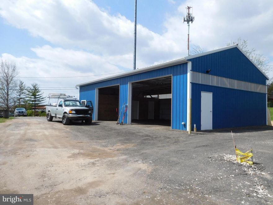 ML zoned. Recent survey, Private rd , , Est 1500 SF   new bldg ., Buyer to verify all info with government agencies. Existing house is tear down?       7611 new construction -see photos, 2 roll-up doors,office and powder room at $325000; 7609 Fitch , lot with  building permit ,demo permit .and demo  for 198000 . Can separate or sell together ; consider leasing and owner finance. Shared drive agreement  needed if two owners