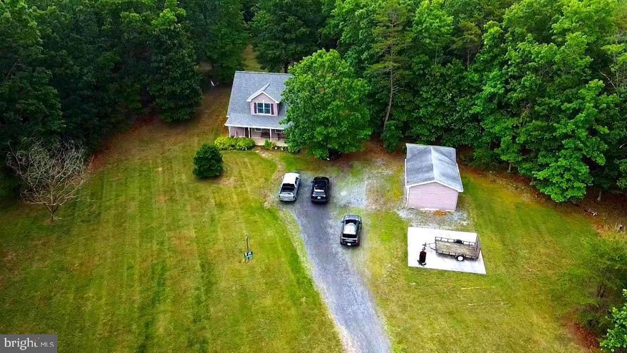 Do not enter the driveway without a scheduled showing, seller is always home.

Here it is, your private mountain oasis. Selling As-Is. This beautiful cape cod sits on 25+ acres. Complete privacy, no homes in sight and surrounded by woods.  Beautiful scenery and wildlife year-round. Seasonal stream, pond with foot bridge and miles of hiking and ATV trails accessible from the yard. Ready for new family to enjoy as much as the current family has. This custom home has many great features, with one-bedroom, full bathroom, and space to entertain on each floor. Custom built-ins with shelving, cabinets and countertops. Brand new roof, new HVAC system, new hot water heater and new well pump. Spacious deck. Large drive through shed with garage doors on both sides, custom shelving and work bench, wired for electric, and even comes with the John Deere Mower too. Sellers will need time to find another home.