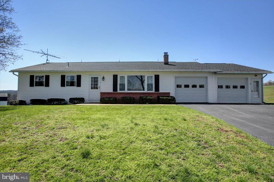 BIG SKY VIEWS! What a setting!  Beautiful countryside, views, & wildlife surround this cozy 2 bdrm rancher w/2 car attached garage situated on 1 country acre in scenic Fulton County.  The setting is so peaceful while the inside of this vintage 1969 home is so warm, featuring hardwood floors, replacement windows, NEW ROOF 2023, central AC and full basement with a canning kitchen complete with appliances.  The home may have a vintage look, but it has been extremely well maintained and clean as a whistle.  It's move-in ready!  This gem on Gem Bridge Rd. is a rare find...it won't last long!  Take a look today!!