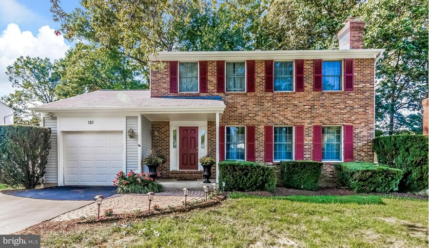 Updated 4 bedroom center hall colonial with 3.5 baths and attached garage. Spacious remodeled kitchen with Granite counter tops , ceramic tile floor and SS appliances. Light Filled Great Room leads to expansive 2 level deck. Lower level features a rec room with wood burning fireplace and separate bedroom with fully finished bath. Entertainment filled backyard.