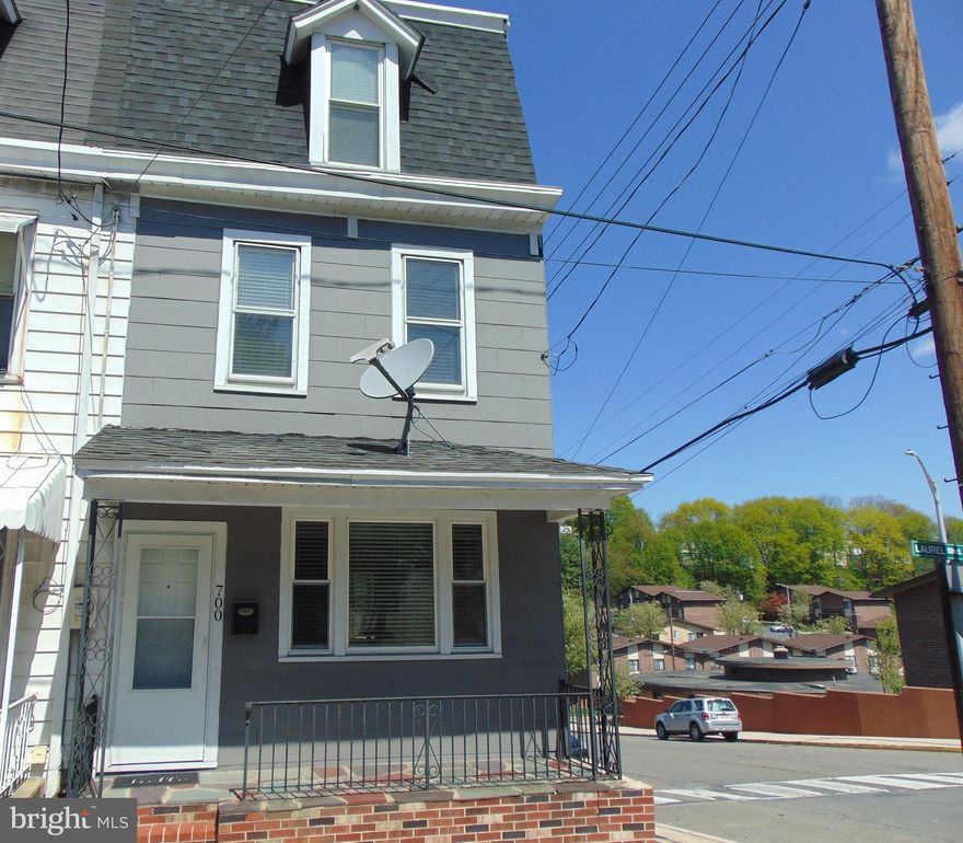 Move right into this totally redone Pottsville home.  Pride of ownership throughout.  Open living and dining rooms featuring beautiful hardwood flooring.  27 handle eat in kitchen.  Second floor features a primary bedroom with sitting room or turn sitting room into a bedroom, nursery or office.  Second floor laundry and a full bath complete the second floor.  Third floor features 2 bedrooms.  Private deck, newer roof, newer windows.