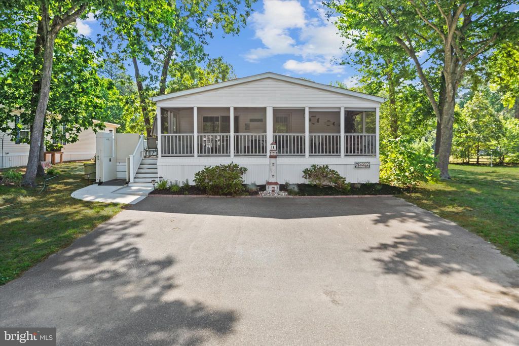 Photo of 26599 Pepperidge Cv, MILLSBORO, DE 19966 (MLS # DESU2112434)