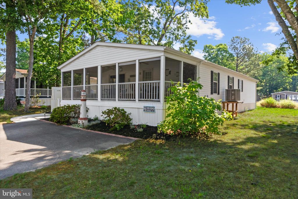 Photo of 26599 Pepperidge Cv, MILLSBORO, DE 19966 (MLS # DESU2112434)