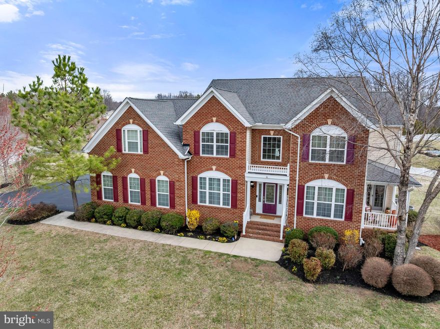 SELLER will offer credit to install privacy fence at closing! Welcome to 1003 Horse Pen Run—an exceptional estate residence nestled on a picturesque corner lot in the highly sought-after Farms at Hunting Creek, where refined living meets the tranquility of Southern Maryland’s natural beauty.

Designed with both elegance and functionality in mind, this expansive five-bedroom, three-and-a-half-bath home offers a thoughtfully curated layout ideal for multigenerational living, everyday comfort, and sophisticated entertaining. From the moment you enter, you are greeted by sunlit interiors, enhanced by large statement windows and timeless architectural details including crown molding, custom trim work, and gleaming hardwood floors throughout the main level.

At the heart of the home, the designer kitchen is both stunning and highly functional—featuring marble countertops, classic shaker cabinetry, under-cabinet lighting, and a well-appointed butler’s pantry with its own sink. The adjoining morning room invites relaxed dining and seamlessly opens to an expansive deck, creating the perfect setting for hosting gatherings or enjoying peaceful mornings overlooking the lush, one-acre homesite.

The family room offers warmth and charm with its fireplace and direct access to a covered porch—an ideal retreat for quiet evenings immersed in nature. A dedicated home office provides the flexibility today’s lifestyle demands, while the formal dining room showcases elegant woodwork and detailing, perfect for more intimate gatherings and special occasions.

Upstairs and beyond, generously sized bedrooms provide space and comfort for all, complemented by fresh updates including new flooring on the upper and lower levels and a bright, neutral palette throughout. Every detail has been thoughtfully refreshed, including a newly coated driveway, ensuring this home is truly move-in ready.

Outdoors, the expansive, flat yard offers endless possibilities—from a future pool or gazebo to evenings under the stars—creating a private sanctuary that is as versatile as it is serene.

Located within one of Calvert County’s top-rated school districts and surrounded by a community beloved by active-duty and retired military families alike, this home offers both a sense of connection and peace of mind. With convenient access to commuter routes serving Washington, D.C., Northern Virginia, Baltimore, and Annapolis, the location is as practical as it is desirable.

Timeless, spacious, and impeccably maintained—1003 Horse Pen Run is more than a home; it is a place to grow, gather, and create lasting memories for years to come.