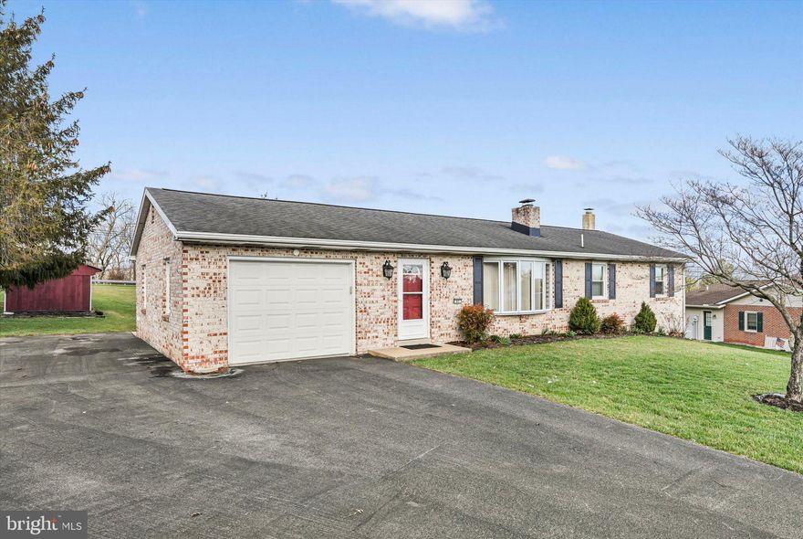 Solid - Low Maintenance Brick Rancher situated in a quiet and convenient location near Brownstown's 222 Exit easing your commute.  Some extra features here are newer insulated windows, patio doors, included kitchen appliances, upgraded bathroom with extra large vanity and 5ft shower.  The floor plan is traditional but features doors that close off the bedroom area and an extra door in bdrm 3 allows it to be repurposed for handy flex space or media room.  The lower level is partially finished allowing for large storage areas.  The north end is a daylight basement with walk out door next to where there is a brick hearth to  hold a wood, coal, or pellet stove for auxiliary heat.  Outside you and enjoy a large back yard with outside storage and extra wide parking area that extends the the back of the garage.  Campers , boats, or extra vehicles can easily fit here.  Modest one story living that still checks all the boxes!