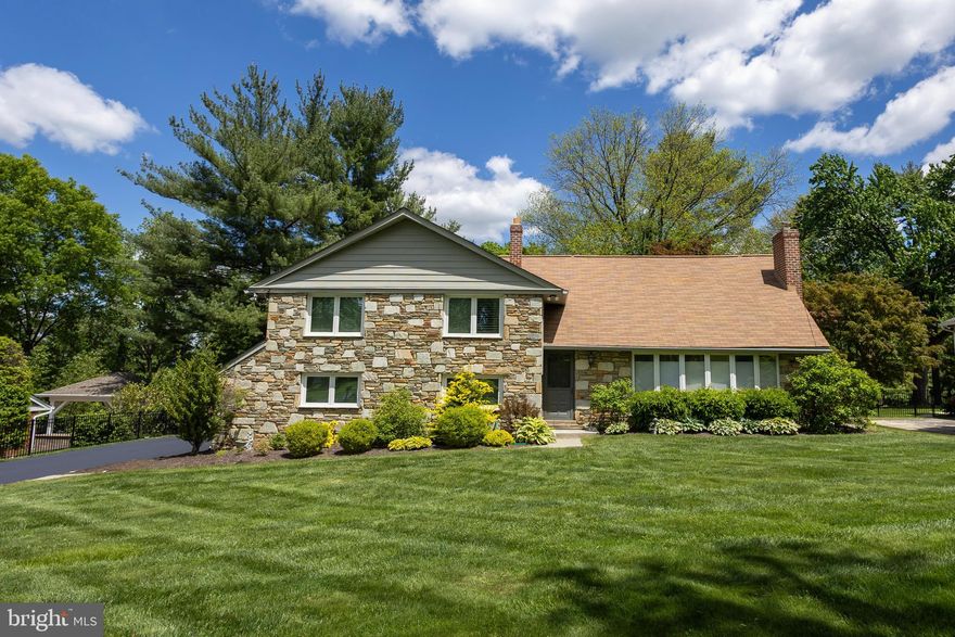 Welcome to this beautifully maintained 4-bedroom, 3 full bath split-level home nestled on a spacious and manicured 0.68-acre lot in the heart of Penn Valley. This bright and inviting residence offers a perfect blend of classic charm and modern updates, ideal for comfortable family living and entertaining. 
The formal living room is bathed in natural sunlight and features gleaming hardwood floors and a stunning wood-burning stone fireplace, creating a warm and welcoming atmosphere. The hardwood floors continue into the formal dining room, perfect for gatherings and special occasions. The updated eat-in kitchen boasts ceramic tile floors, granite countertops, stainless steel appliances, and a view overlooking the expansive, level, fenced-in backyard—an ideal space for outdoor fun and relaxation. Step down into the cozy family room with a second fireplace, ceramic floors, access to the backyard, a newly renovated full bathroom, and a convenient laundry room. A few steps further lead to a versatile finished basement offering additional living space—perfect for a playroom, home gym, office, or media room. Upstairs, the primary suite features separate closets and a luxurious new ensuite bathroom with a glass-enclosed shower. This level has three additional spacious bedrooms and another beautifully updated full hall bathroom. Other features include a 2 car garage and new heating and air conditioning  unit.  Located in the award-winning Lower Merion School District, this home offers an easy commute to Center City with convenient access to major roadways. Close to top-rated schools, parks, and places of worship, this home truly has it all. Don’t miss your opportunity to own this wonderful home in a prime Penn Valley location!
