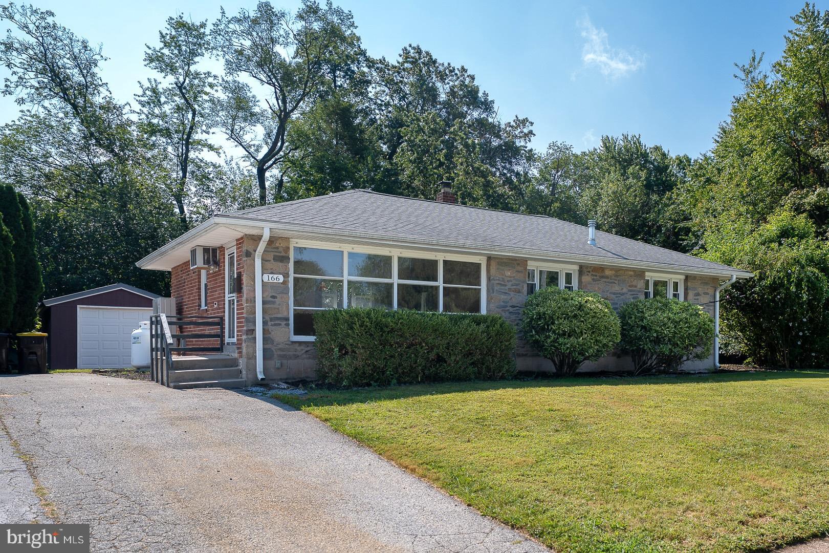 Charming West Norriton ranch home offers the convenience of one-floor living on a spacious lot in a walkable neighborhood! Large living room has plenty of room for relaxing or entertaining, and the updated kitchen is sure to impress. Three bedrooms and an updated hall bath complete the main level. Gorgeous hardwood floors throughout. The finished basement with vented propane stove would be a fantastic family room, office, or home gym. Lower level also includes an updated full bathroom with clawfoot tub and laundry closet. Large unfinished storage area. VRF HVAC system provides efficient heating and cooling and keeps the house comfortable year 'round. Beautiful level back yard with storage shed - perfect for entertaining or relaxing. Close to Walsh Field and Whitehall Loop Trail. Don't miss this one!