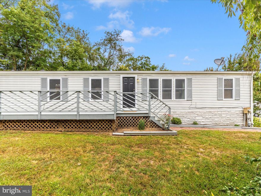 Highland Manor-Back on market, Buyer couldn’t get financing.  3 Bedroom, 2 Fullbath  home with many upgrades.  Open Floorplan with vaulted ceilings, full size Washer & Dryer.  MBR has FB with soaking Tub and Sep. Shower, Dual vanity.  Large wrap around deck.  NO LOT RENT.   Fee Simple sale.