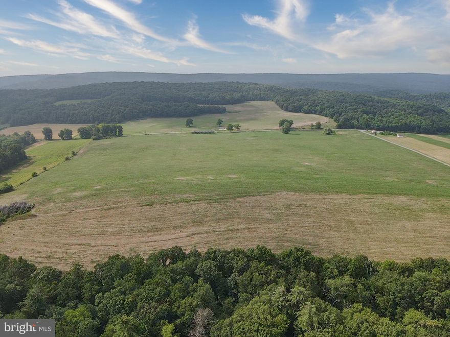 Totaling 161 acres these Mahoning Valley parcels offer an assortment of possibilities. Located near the intersections of 443 and 309 and short drive to the PA Turnpike Northeast Extension  the location cannot be beat. Enjoy the quiet country living with great views to the south. The southern 58 acres is zoned suburban residential. The portion proposed for development has been cleared. Do not miss this opportunity!