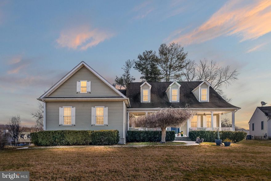 Welcome home to this fabulous, open concept coastal home in the sought after, private, water-oriented community of Chesapeake Isle.  Enter this well-built home through its spacious and airy porch which overlooks a grassy front yard.  The Great Room will take your breath away with its impressive, vaulted ceilings with extra large dormer windows to let natural light stream in.  A beautiful gas fireplace with stone surround and hearth is graced with built-in cabinetry to provide a lovely accent to this space which can easily entertain family and friends.  Large, unique, arched doorways lead you into the dining area and kitchen.  The dining area has elegant wainscotting, high ceilings and large windows.  Enjoy morning coffee or a relaxing evening on the spacious azek type deck area right off the Great Room.  Deck area has plenty of room for dining, grilling, and soaking in the hot tub.  Step down into the low maintenance, graveled, fenced in backyard . . . perfect for pets!  The kitchen offers granite countertops, stainless appliances, tall cabinetry, tile flooring, and a charming breakfast nook in a bay windowed area.  First floor primary suite offers extra tall windows, a large walk-in closet, and a recently renovated en-suite bath.  Relax after a hard day soaking  in the tile surrounded soaking tub.  New walk-in shower with glass doors, a double vanity sink, and a water closet for privacy complete this space.  Completing the first floor are two additional bedrooms, a center hall bath, and mud/laundry room.  Hardwood flooring thorough most of the first floor.  The grandeur of this home continues to the spacious second floor which you ascend via the staircase which is accessible from the kitchen.  A huge loft with large dormer windows overlooks the Great Room and provides the perfect space for reading or relaxing.  The 4th bedroom has high ceilings, direct access to the 2nd floor center hall bath, and access to an unfinished space off the bedroom which could be an amazing office, playroom, etc . . . let your imagination run wild!  An additional unfinished space is ready to finish with a large dormer window and could be a home gym, extra office/work space, etc.  . . the possibilities are endless.  Storage spaces abound on the 2nd floor as well.  The basement area with poured 8 foot concrete walls  is massive!  Large two car garage with high ceilings keep your vehicles safe from the weather.  The community is a water enthusiasts'  dream with a community boat ramp, harbor area, and dinghy/kayak storage area.  You can also entertain or enjoy the plethora of community activities from the pavilion area with a beach, volleyball, and pickle ball court.  Located next to Elk Neck State Park, Turkey Point Lighthouse, and minutes away from the quaint town of North East with shops and restaurants.  It is conveniently located near the I-95 corridor.
