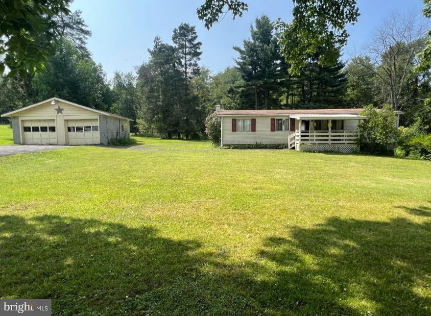 A 3 bedroom, 2 bath home with a 2 car detached garage sitting on 1.4 mostly level Acres. Additional integral garage could fit multiple cars or would make a great workshop for your hobbies! Inside is outdated but in great condition. It features a nice open floor plan with the kitchen, dining and living areas. 2 bedrooms and a bathroom on one end and the owner bedroom and bathroom on the other end. This property has a BRAND NEW 260ft well and purification system along with the old well to use for things that don't need filtered like washing your cars or watering your garden. Now completely ready for first time home buyers, VA and FHA loans! So much bang for your buck. Come take a look!