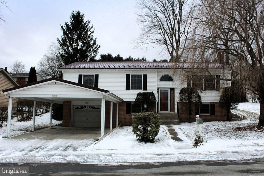 This beautiful estate is waiting for you to make it your forever home. Nestled in the charming Norwegian subdivision, this exquisite bi-level residence offers a harmonious blend of comfort and sophistication. Built in 1973, this home has been thoughtfully designed to cater to a luxurious lifestyle while providing a warm and inviting atmosphere. As you step inside, you are greeted by a spacious and airy layout that seamlessly connects the living spaces. The heart of the home features a cozy gas fireplace, perfect for creating a tranquil ambiance during cooler evenings. The plush carpeting throughout adds a touch of elegance, inviting you to sink in and relax. The dining area is an ideal setting for intimate gatherings or festive celebrations, where memories are made over shared meals.  This residence boasts three generously sized bedrooms, each designed to be a personal retreat all with ample closet space. The 2 full bathrooms ensure convenience and privacy, accommodating both residents and guests with ease. Venture downstairs to discover a fully finished basement that offers endless possibilities with a 1/2 bath. With daylight pouring in, this versatile space can serve as a home office, entertainment area,playroom or a cozy den. The exterior of the home is equally impressive, featuring a brick front that exudes timeless charm. The attached garage  and carport provide ample parking, while the asphalt driveway ensures easy access. A shed on the property adds additional storage for outdoor equipment or hobbies. Set on a generous 0.21-acre lot, the outdoor space is perfect for enjoying the fresh air or hosting summer barbecues. This property is not just a house; it's a lifestyle. Experience the perfect blend of luxury and comfort in a home that invites you to create lasting memories. Embrace the opportunity to make this exquisite residence your own.