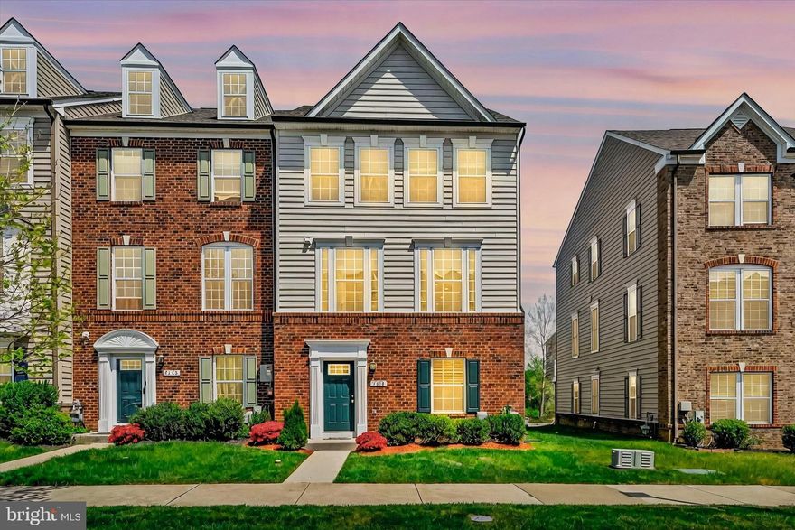 Introducing a remarkable end-unit 4-bedroom townhome nestled within the desirable Ballard Green community in Owings Mills. This residence offers a central location in Owings Mills, with convenient access to shopping and more. Positioned near the community center, residents enjoy easy access to amenities such as a gym, pool, and park, enhancing the overall quality of living.  

Step inside the Schubert's model to discover a layout that effortlessly combines comfort and elegance. The entry-level features a bedroom with an ensuite bathroom, ensuring privacy and convenience. The main level showcases a bright and spacious interior, highlighted by a modern kitchen boasting a large center island, granite countertops, and stainless steel appliances. The adjacent dining area seamlessly transitions to a deck, perfect for hosting gatherings or unwinding outdoors. 
Upstairs, three generously-sized bedrooms await, including the owner's suite with a sizable closet and a luxurious ensuite bathroom complete with a double sink vanity and soaking tub.  Additionally, a laundry room on this level adds practicality to this refined home.

Experience the harmonious blend of style and functionality in this inviting townhome. Schedule a viewing appointment today to envision a lifestyle of true sophistication and comfort...!!