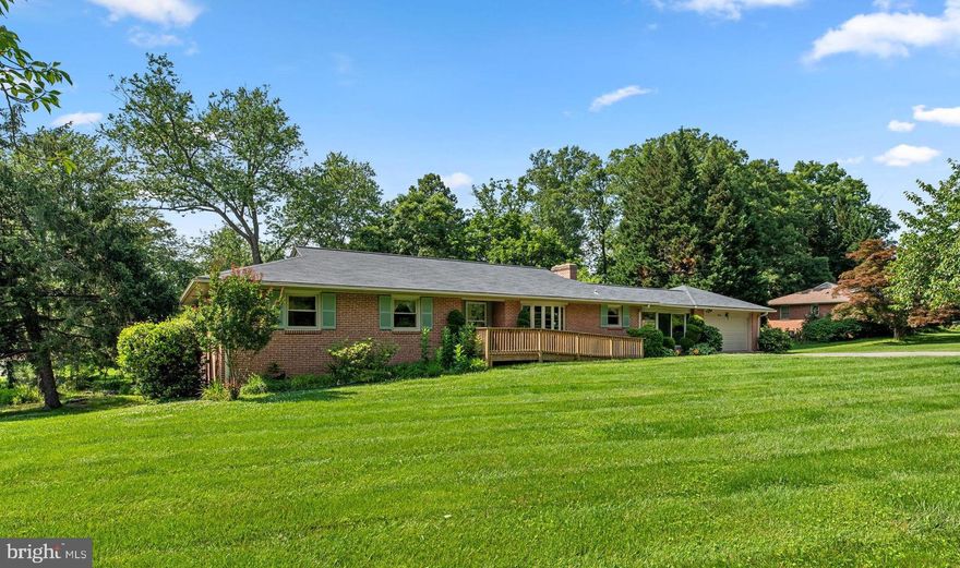 OFFER DEADLINE: MONDAY, JUNE 16TH AT 10 AM. 
This 1,900+ square foot rancher is located in desirable Howard Heights with no HOA and plenty of parking in the driveway and the 2-car garage. You’ll love all the updates & classic touches that this rambler has to offer! Say goodbye to rainy-day hassles thanks to the heated breezeway that connects the garage directly to the kitchen. This year-round space creates a cozy and convenient entry for guests and offers peaceful backyard views. A concrete walkway leads to the front door, where you're welcomed by a spacious entryway with a coat closet. Hardwood flooring flows into the dining room, which features a bay window and a pocket door to the kitchen. The dining room opens into a sun-filled living room with a fireplace flanked by built-in shelving and large windows that showcase seasonal views. The kitchen offers ample cabinet and counter space, along with a generous pantry for extra storage. Down the hall are four spacious bedrooms and three full bathrooms, including an addition that expanded the home to include the fourth bedroom and third full bath—perfect for busy mornings or multigenerational living. The owner’s suite overlooks the backyard and includes two sizable closets and an ensuite bath with a Jacuzzi tub, upgraded tile, and a separate shower. The finished basement is ready to entertain! A custom bar with built-in shelving, a sink, and a 2-burner cooktop sets the stage for movie nights or game days. A unique partition wall with built-in planter trough with lighting is great for displaying your favorite house plants or setting up a buffet, while dividing the bar from a versatile open area. Whether you're envisioning a home gym, hobby room, or space for holiday dinners, this area adapts to your needs. Slide open the door to the solarium and soak up the sunshine without the bugs. This bright bonus room has electricity, a ceiling fan, and direct access to the back patio. A dedicated office with built-in shelving, a half bath, and a laundry room that connects to a workshop—ideal for tinkering, fixing, or creating—round out the lower level. Outdoors, relax in the gazebo swing, host summer BBQs on the patio, and unwind to the soothing sound of the creek that runs along the back of the property. With over $170K in upgrades—including a new boiler and water heater (2022), roof (2019), air conditioner (2019), and more—this one-of-a-kind home is move-in ready for your next chapter. Property is being sold as-is.