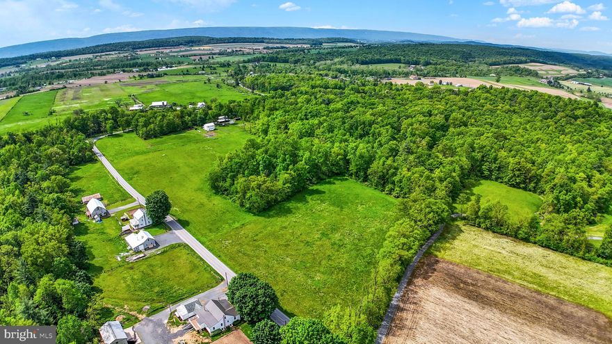 Beautiful 12.86 acre building lot with recent perc test & new survey! Property is a combination of open/tillable land & woodland. Plenty of road frontage along Billyville Rd and is an excellent location just minutes from Mifflintown and McAlisterville! Ideal lot to build your home or cabin! TAXES ARE ESTIMATED!