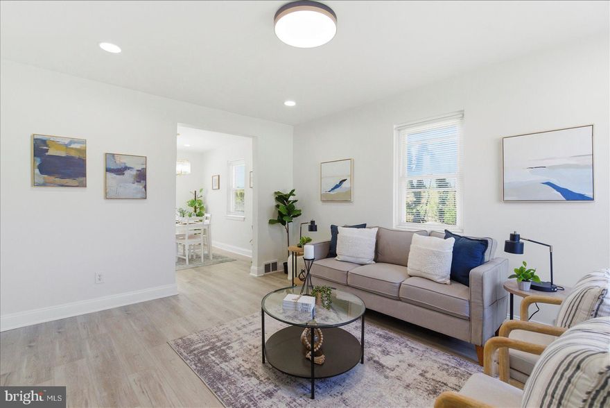 Newly renovated and move-in ready end of group Townhome located in the desirable neighborhood of Hillvale.  Make your way past a lush green lawn on the way to the front porch and the door into your new home.  Step inside a home filled with natural light, recessed lighting, glamorous light fixtures, a freshly painted interior in a neutral color palette, and luxury flooring throughout.  The main floor offers a large living room, a dining room, and a stunning kitchen.  The kitchen features mixed metal with gold accents and stainless steel appliances including a slide-in gas range, ample cabinetry, sleek quartz countertops with a complementing backsplash, and a stainless sink.  On the second floor are two sizable secondary bedrooms, a larger primary bedroom, and a newly remodeled full bathroom. On the lower level features additional finished living space, including a full bath with a walk-in shower, stacked laundry, storage, utilities, and a room that can be used as a flex space/office or bedroom...  From the kitchen step outside onto a deck that overlooks the fenced yard offering tons of green space, room for entertaining, and so many possibilities.  This move-in-ready home offers new homeowners much and is located near shopping, restaurants, and commuter routes.