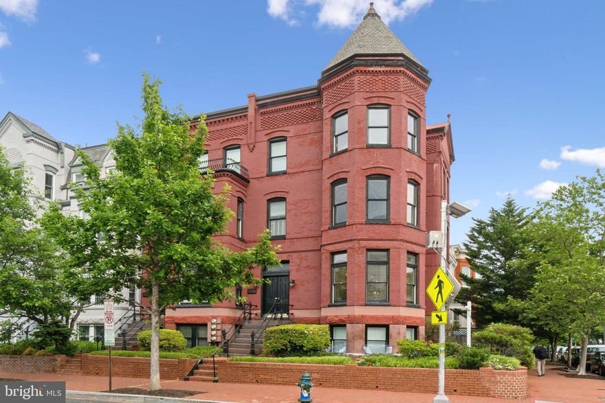 Welcome to Unit #1, a beautifully updated one-bedroom condo in the heart of historic Capitol Hill—just steps from the U.S. Capitol and directly across from the Supreme Court. This charming residence blends historic character with modern comforts, offering hardwood floors, soaring ceilings, elegant crown molding, and fresh paint throughout. Natural light pours into the spacious living room through four oversized windows, enhanced by a distinctive turret-style bump out that adds both charm and extra square footage. A cozy gas fireplace anchors the space, complemented by a historical chandelier sourced from the Washington DC Historical Society—perfect for cozy evenings in. The dining area features custom built-in benches providing both extra seating and hidden storage, while the open-concept kitchen impresses with stainless steel appliances (including a paneled refrigerator), ample cabinetry, new pendant lighting over a generous island, and under-cabinet lighting for added ambiance. The serene primary suite includes built-ins and a full en-suite bath with updated flooring and lighting. Additional highlights include an in-unit washer and dryer, and an electrical system upgrade completed in 2015. This pet-friendly and investor-friendly building allows both long- and short-term rentals—ideal for homeowners and savvy investors alike. Situated in one of DC's most iconic neighborhoods, you're just minutes from the National Mall, Stanton Park, Eastern Market, the Metro, Trader Joe’s, and many of the city’s top restaurants and landmarks.