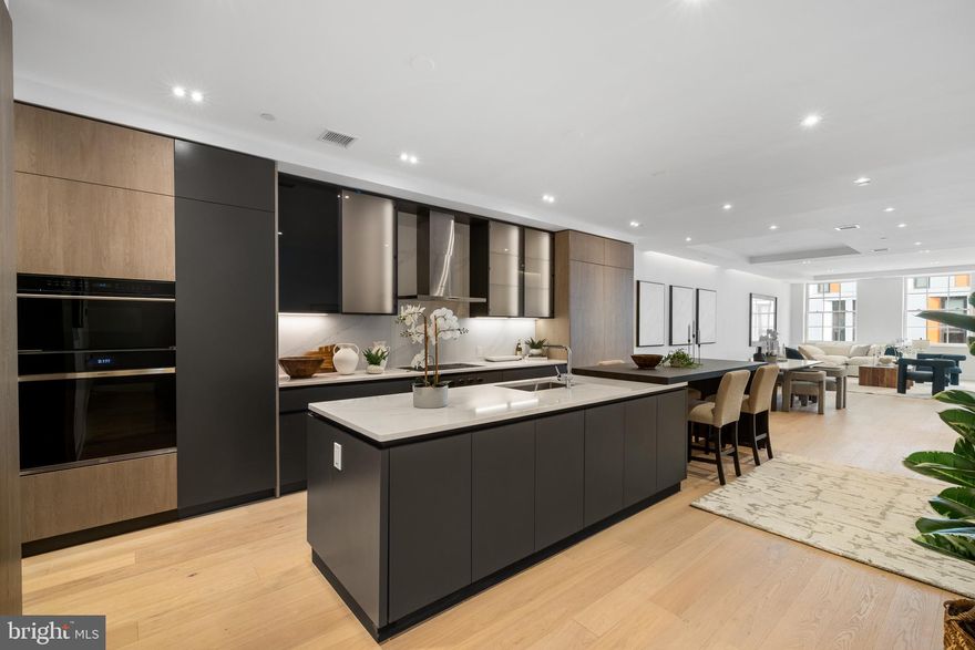 Introducing Residence 4 at 124 N. 2nd Street - a rare, full-floor residence located in one of Philadelphia’s most exclusive and historically rich neighborhoods. Developed by the esteemed Astoban Investments, known for architecturally distinctive and design-forward projects, this newly constructed boutique condominium features just four private homes - each occupying an entire floor for an exceptional blend of privacy, scale, and sophistication.

Spanning 2,805 square feet, Residence 4 is accessed via a private elevator that opens into a dedicated reception vestibule reserved exclusively for this unit. Behind the building’s classic 1920s façade, the interiors have been completely reimagined with clean architectural lines, high ceilings, and oversized windows that bathe the space in natural light from morning through dusk. Wide-plank Austrian oak flooring adds warmth and refinement, complementing the home’s airy, contemporary layout.

At the center of the residence is an Italian-imported Scavolini kitchen, a sculptural showpiece with minimalist cabinetry and bookmatched Compac Unique Calacatta countertops. Designed for both beauty and performance, the kitchen is outfitted with a suite of professional-grade appliances, including a 36” Wolf gas range, Sub-Zero refrigerator, Wolf microwave, ASKO dishwasher, and wine fridge. The oversized island anchors the expansive open living and dining areas, creating an ideal setting for both intimate evenings and stylish entertaining.

Three spacious bedrooms each offer custom walk-in closets and en-suite baths for the ultimate in comfort and privacy. The primary suite serves as a tranquil retreat, featuring radiant-heated floors, an oversized glass-enclosed steam shower, a deep soaking tub, and dual floating Scavolini vanities. Bathrooms throughout are finished with Porcelanosa marble, mosaic, and porcelain tile, and enhanced by designer fixtures from Fantini, Dornbracht, Grohe, and Hansgrohe - blending modern minimalism with quiet elegance.

Thoughtful design and premium finishes continue throughout the home, including 8-foot solid-core interior doors, frameless glass showers, and custom cabinetry and organization systems by Culnova and Inspired Closets. The residence is also equipped with a full-size Whirlpool washer and dryer, a two-zone Daikin HVAC system for efficient climate control, ButterflyMX video intercom for secure entry, and Nest x Yale keyless access for modern convenience.

One garage parking space is included with the residence. A full 10-year property tax abatement adds significant long-term value.

Entirely new construction within the shell of a historic Philadelphia building, Residence 4 at 124 N. 2nd Street offers the rare opportunity to own a home that combines timeless architectural character with the finest in contemporary design. With only four residences in the building and unmatched access to Old City’s dining, art, and cultural scene, this is luxury boutique living at its best.