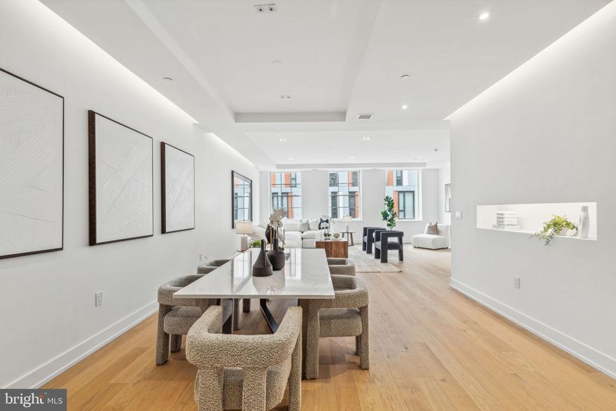 Introducing Residence 4 at 124 N. 2nd Street - a rare, full-floor residence located in one of Philadelphia’s most exclusive and historically rich neighborhoods. Developed by the esteemed Astoban Investments, known for architecturally distinctive and design-forward projects, this newly constructed boutique condominium features just four private homes - each occupying an entire floor for an exceptional blend of privacy, scale, and sophistication.

Spanning 2,805 square feet, Residence 4 is accessed via a private elevator that opens into a dedicated reception vestibule reserved exclusively for this unit. Behind the building’s classic 1920s façade, the interiors have been completely reimagined with clean architectural lines, high ceilings, and oversized windows that bathe the space in natural light from morning through dusk. Wide-plank Austrian oak flooring adds warmth and refinement, complementing the home’s airy, contemporary layout.

At the center of the residence is an Italian-imported Scavolini kitchen, a sculptural showpiece with minimalist cabinetry and bookmatched Compac Unique Calacatta countertops. Designed for both beauty and performance, the kitchen is outfitted with a suite of professional-grade appliances, including a 36” Wolf gas range, Sub-Zero refrigerator, Wolf microwave, ASKO dishwasher, and wine fridge. The oversized island anchors the expansive open living and dining areas, creating an ideal setting for both intimate evenings and stylish entertaining.

Three spacious bedrooms each offer custom walk-in closets and en-suite baths for the ultimate in comfort and privacy. The primary suite serves as a tranquil retreat, featuring radiant-heated floors, an oversized glass-enclosed steam shower, a deep soaking tub, and dual floating Scavolini vanities. Bathrooms throughout are finished with Porcelanosa marble, mosaic, and porcelain tile, and enhanced by designer fixtures from Fantini, Dornbracht, Grohe, and Hansgrohe - blending modern minimalism with quiet elegance.

Thoughtful design and premium finishes continue throughout the home, including 8-foot solid-core interior doors, frameless glass showers, and custom cabinetry and organization systems by Culnova and Inspired Closets. The residence is also equipped with a full-size Whirlpool washer and dryer, a two-zone Daikin HVAC system for efficient climate control, ButterflyMX video intercom for secure entry, and Nest x Yale keyless access for modern convenience.

One garage parking space is included with the residence. A full 10-year property tax abatement adds significant long-term value.

Entirely new construction within the shell of a historic Philadelphia building, Residence 4 at 124 N. 2nd Street offers the rare opportunity to own a home that combines timeless architectural character with the finest in contemporary design. With only four residences in the building and unmatched access to Old City’s dining, art, and cultural scene, this is luxury boutique living at its best.