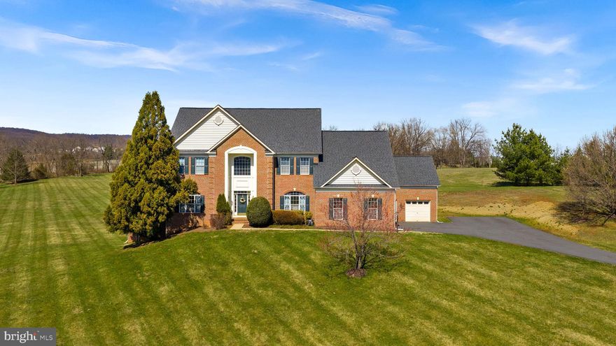 Welcome to 42037 Heaters Island Ct!

This 8,700+ sqft estate on 7.2 acres offers the perfect balance of luxury living and privacy in the highly sought-after and rarely available neighborhood of Leesburg Crossing. Enjoy the freedom of NO HOA while still benefiting from a prestigious, luxury neighborhood setting. The expansive, flat lot is agricultural and animal friendly, and the long private driveway provides ample parking for guests, in addition to the attached 3-car garage.Upon entry, you are welcomed by a stunning two-story grand foyer with a curved staircase. The traditional floor plan is both functional and inviting, featuring a formal living room with gas fireplace, formal dining room, breakfast area, and a spacious family room with tray ceilings equipped with a second gas fireplace. The main level also includes a bedroom that can serve as a private office, along with a bright great room highlighted by large arched windows that fill the space with natural sun light. The kitchen offers abundant counter space, ample seating, stainless steel appliances with double oven, and extensive cabinetry for storage. 

Upstairs, the expansive primary suite impresses with tray ceilings and a separate sitting area that can be enclosed with double doors—ideal for a private lounge, library, or TV retreat. The luxurious primary bath features a soaking tub, separate shower, water closet, dual vanities, and a generous linen closet. The upper level also includes three additional spacious bedrooms and three full bathrooms. 

The finished lower level provides a large open recreation area with walkout access, an additional bedroom, full bathroom, and two versatile dens perfect for a gym, media room, or hobby space. A separate unfinished area offers abundant storage. Major updates include a new roof (2024) and two new HVAC systems (2024) with 3-zone heating and cooling.

Ideally located just minutes from Downtown Leesburg, you’ll enjoy convenient access to restaurants, boutique shopping, coffee shops, grocery stores, and community events. Nearby attractions include Leesburg Premium Outlets, Loudoun County’s renowned wineries and breweries, and scenic outdoor trails. Commuters benefit from easy access to Route 7, Route 15, and the Dulles Greenway, with Dulles International Airport a short drive away. The home is also served by highly regarded Loudoun County public schools. This home checks all the boxes!